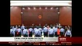 China tries five accused cult members for murder